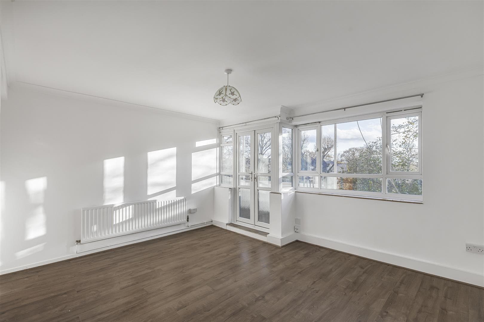 Esher Gardens, London, SW19 6BZ